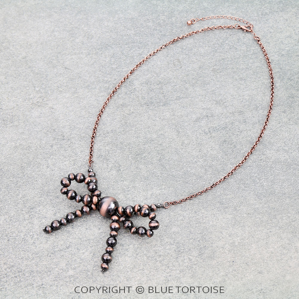 Navajo Style Pearl Bow Necklace