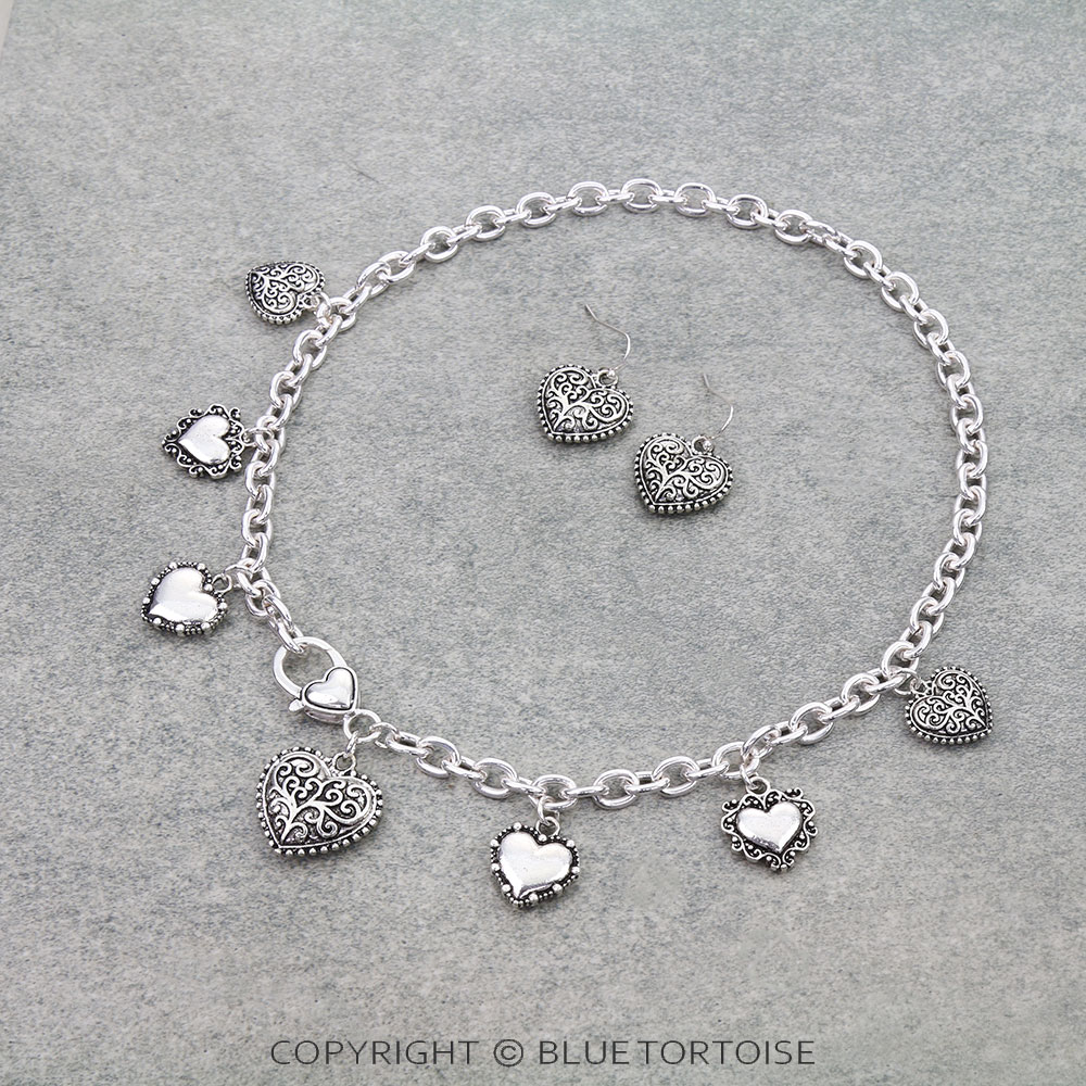 Tailored Heart Multi Charm Statement Necklace Set